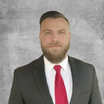 Headshot photo of Chris Chisholm, Infosec scholarship winner in 2022